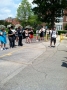 Faculty and Staff cheer on the EC men's tennis team as they leave...