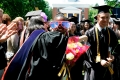 Blue Skies Award-winner Amani Edwards'12 hugs McNair Director Aurora...