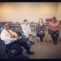 Rep. Keith Ellison, left, meets with Auggies Nic Adducci, Andrea Batt...