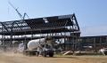 Cement trucks arrived at the construction site of the School of Osteopathic...