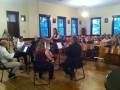 Student Laura Glidewell directs an original musical composition she...