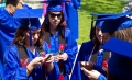 Hmmm...what were these recent graduates texting about?