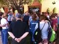 Bailey McBride leads a prayer of blessing over sponsors Jim and Celeste...