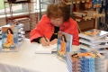 Campbell Trustee Ester Holder Howard signed copies of her book, "That...