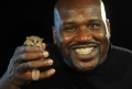 Retired NBA superstar and newly minted Ph.D. Shaquille O'Neal displays...